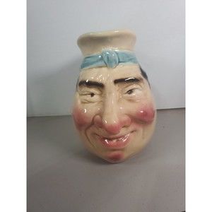 Antique Sarreguemines Majolica "Jolly Fellow w/ Blue" Jug #3181, chipped.